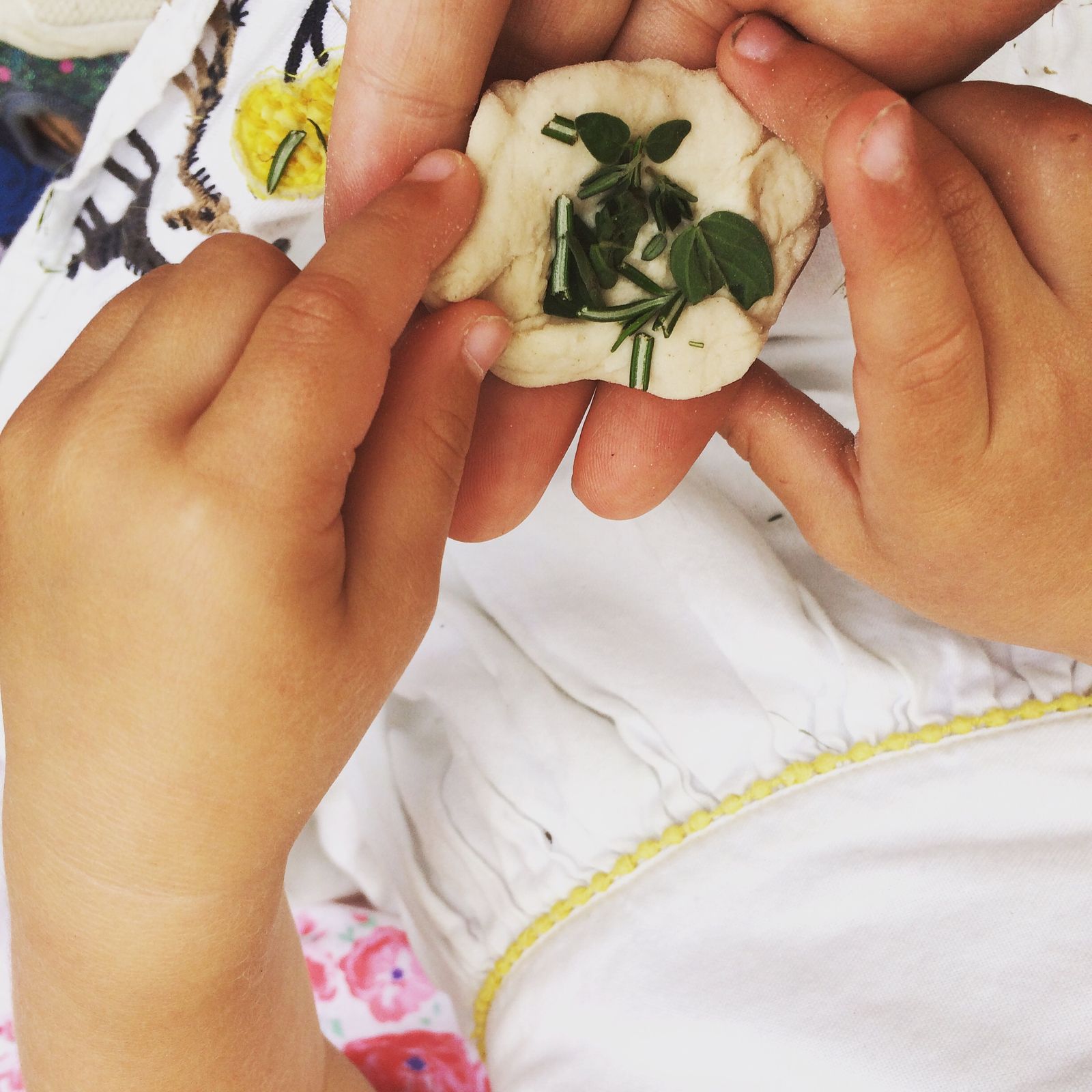 Herb roll making on an open fire